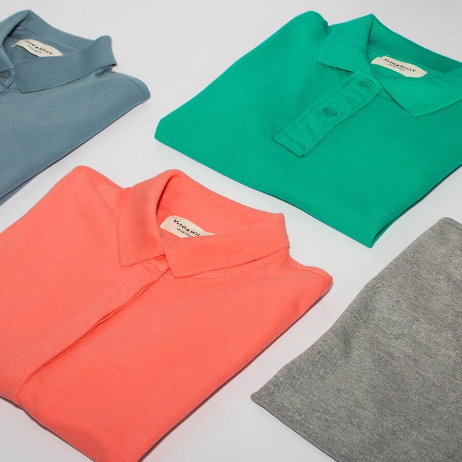 Polo shirt hasil konveksi warna oranye, tosca, dan abu